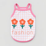 Fruit and floral pet tank top with pink trim, white grid, orange flower prints