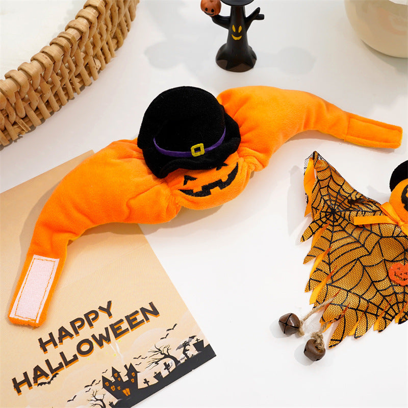 Orange pumpkin pet costume pants with black witch hat, Halloween set accessories on table