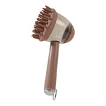 Pet bath brush with brown round bristle head and short handle
