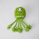 Green octopus plush pet toy with smiling face, big eyes, and long tentacles