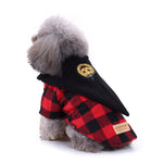 Black and red dog costume with beak headpiece and buffalo plaid body