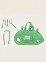 Green portable pet carrier harness with handle straps and front ID label pocket