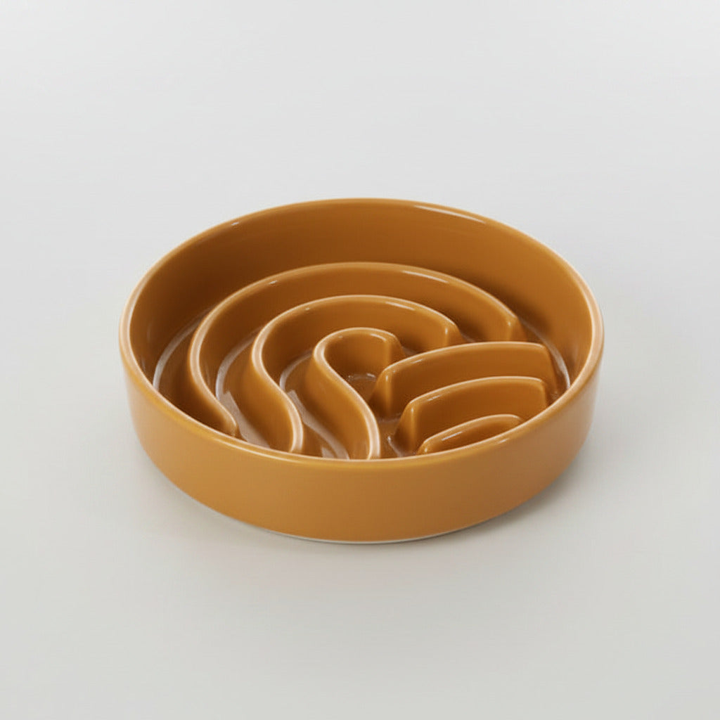 Orange wave slow feeder dog bowl with wavy channels inside, no stand