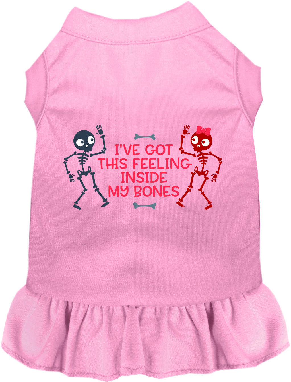 Light pink sleeveless pet dress with ruffled hem and skeleton graphic on front