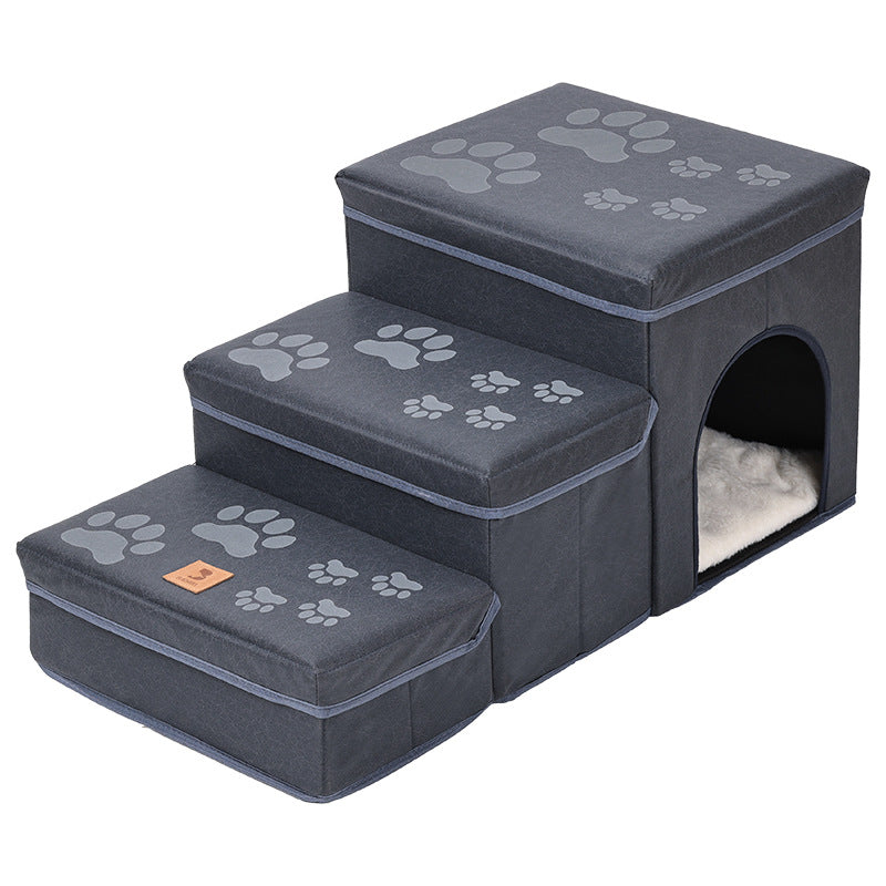Dark gray dog stairs with paw-print cushions, three steps and a side cave bed