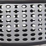 Pet carrier ventilation panel with round perforations and mesh window, close-up