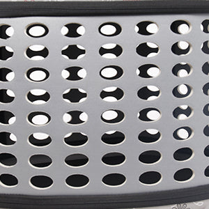 Pet carrier ventilation panel with round perforations and mesh window, close-up