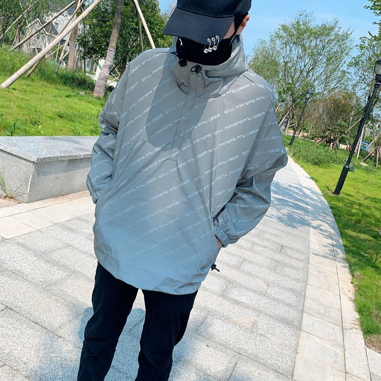 Adult hooded reflective-letter windbreaker, light gray-blue, front zip, elastic cuffs