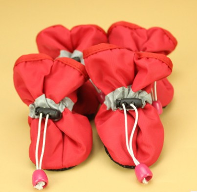 Red soft dog boots with lace-up cords and pink pull tabs, grippy sole