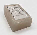 Pet soap bar with front label on beige rectangular block