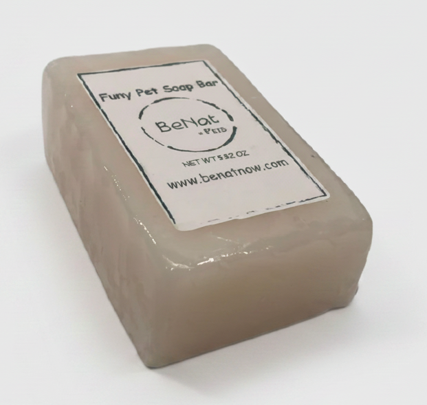 Pet soap bar with front label on beige rectangular block
