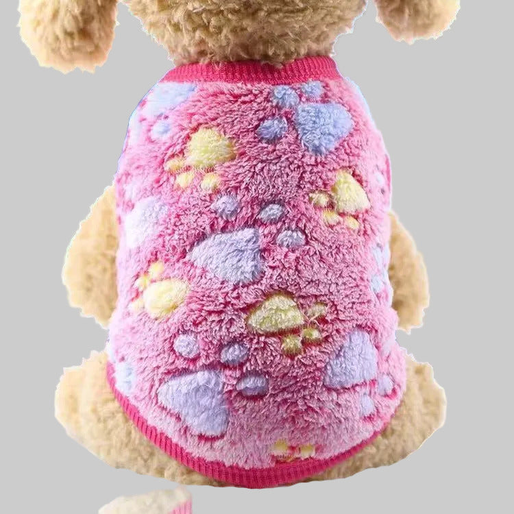 Pet fleece vest in pink and purple with playful multicolor paw and star patches
