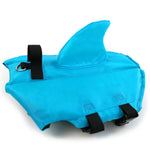 Blue dog swim suit close-up with flotation hood, black straps, and loop handle