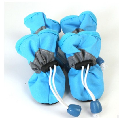 Blue soft dog boots with lace-up cords and grippy sole, small pull tabs