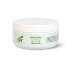 Healing salve jar with white lid and green label, net wt 2 oz (59 g)
