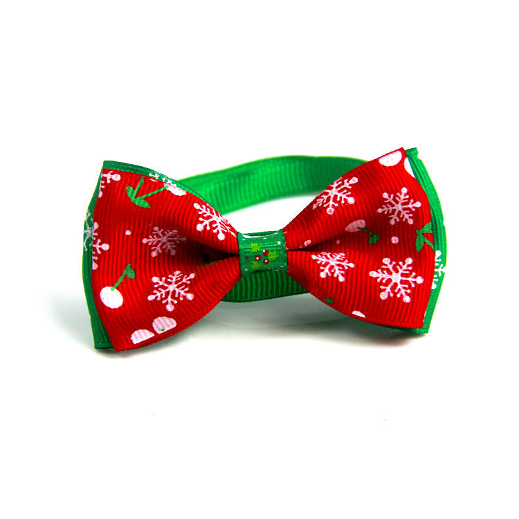 Red and green Christmas bow tie for pets with holiday snowflake prints and band