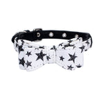 Pet collar with black-and-white star print strap and bow, black stars, silver grommet studs