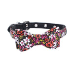 Multicolor floral bow pet collar on black strap with silver grommet studs