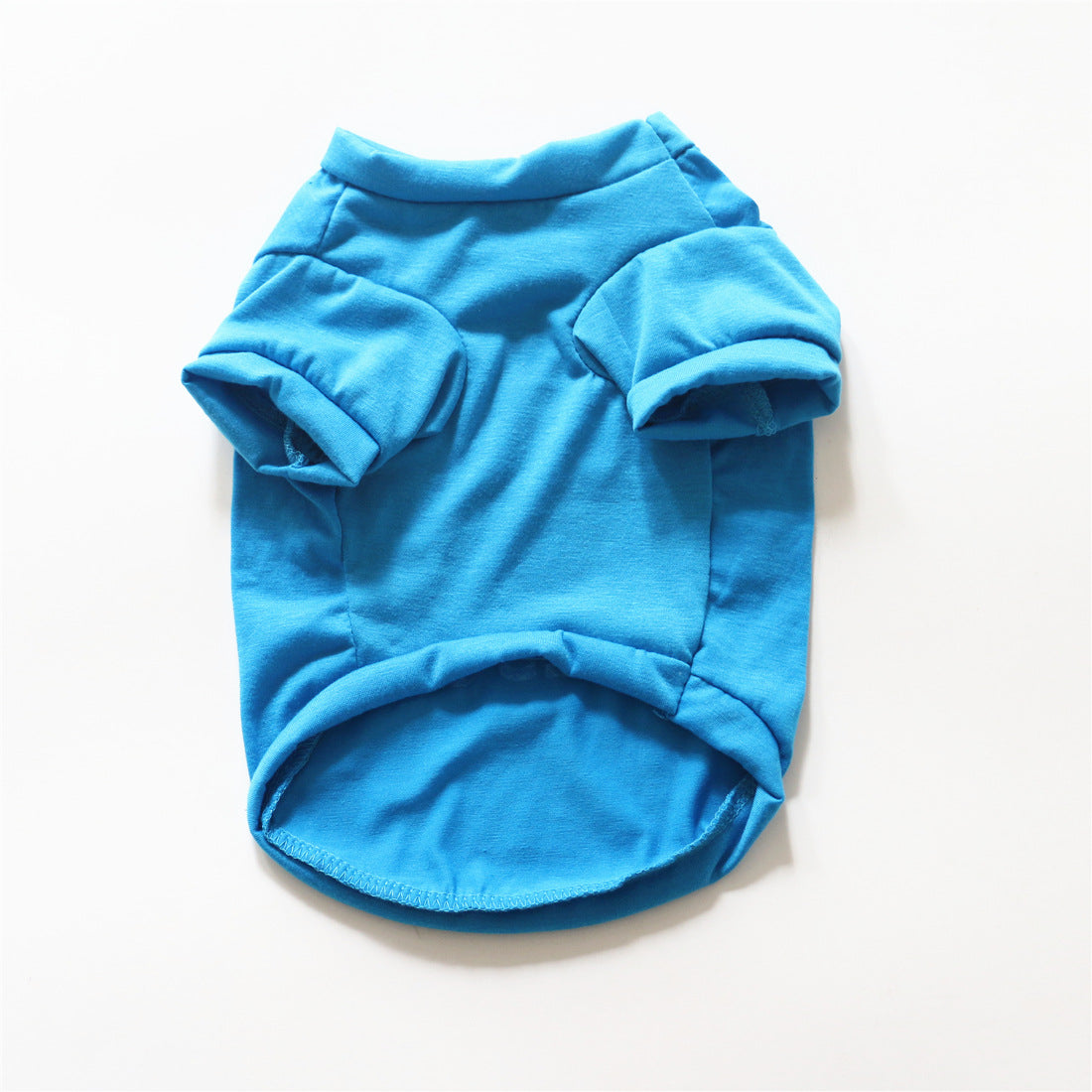 Blue cotton dog summer vest with short sleeves and round belly opening