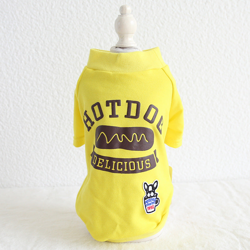 Yellow dog hoodie sweatshirt with Hotdog Delicious graphic and small chest patch