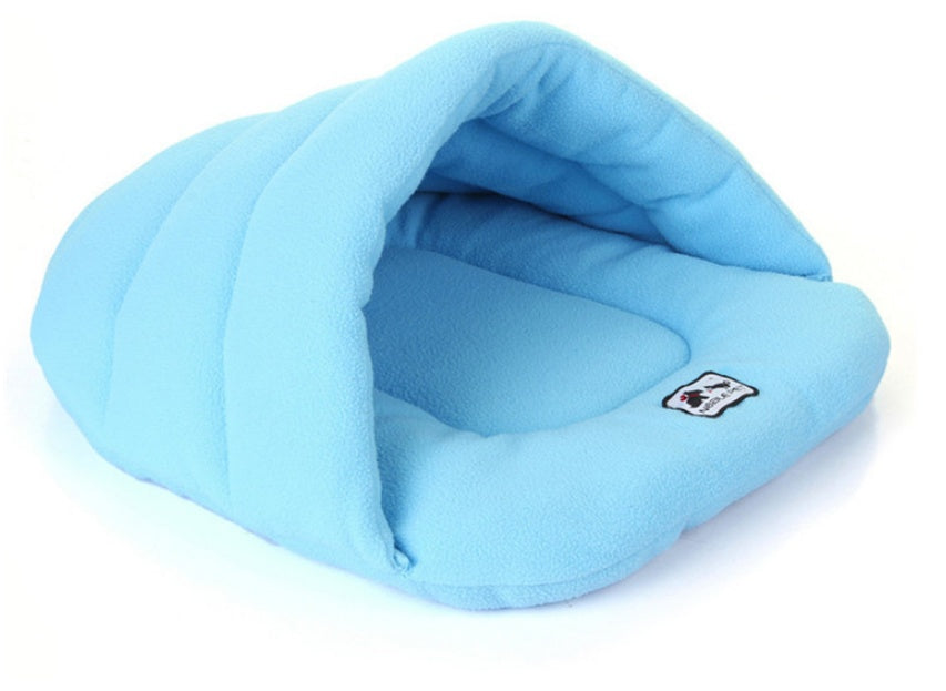 Sky blue pet cave sleeping bag with padded interior and logo patch