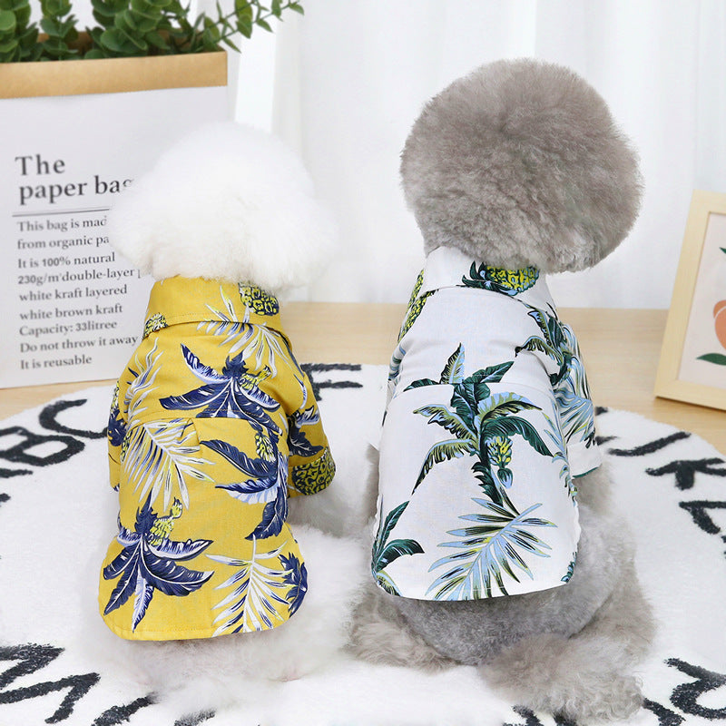 White tropical-print cotton dog shirt with green leaves, short sleeves