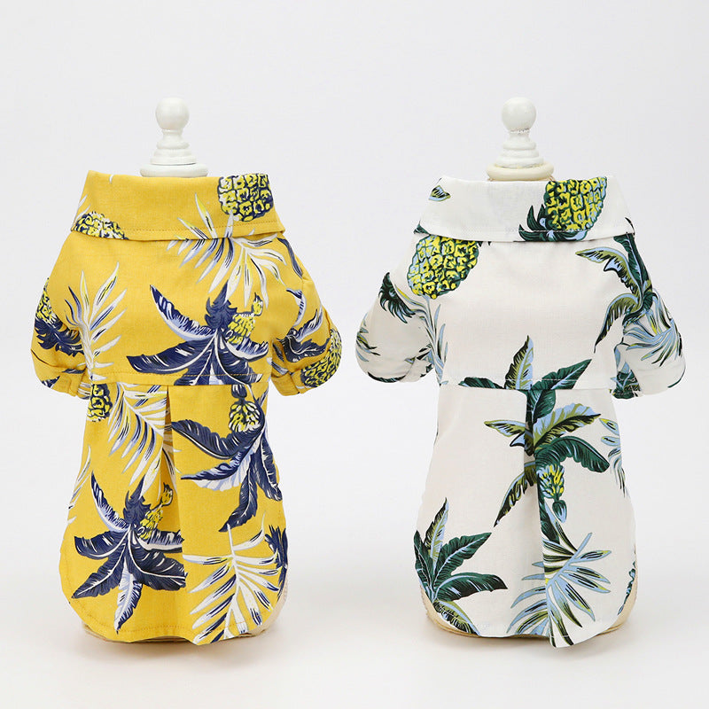 Yellow and blue tropical-print cotton dog shirt, front view