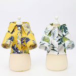 White and green tropical-print cotton dog shirt, front view