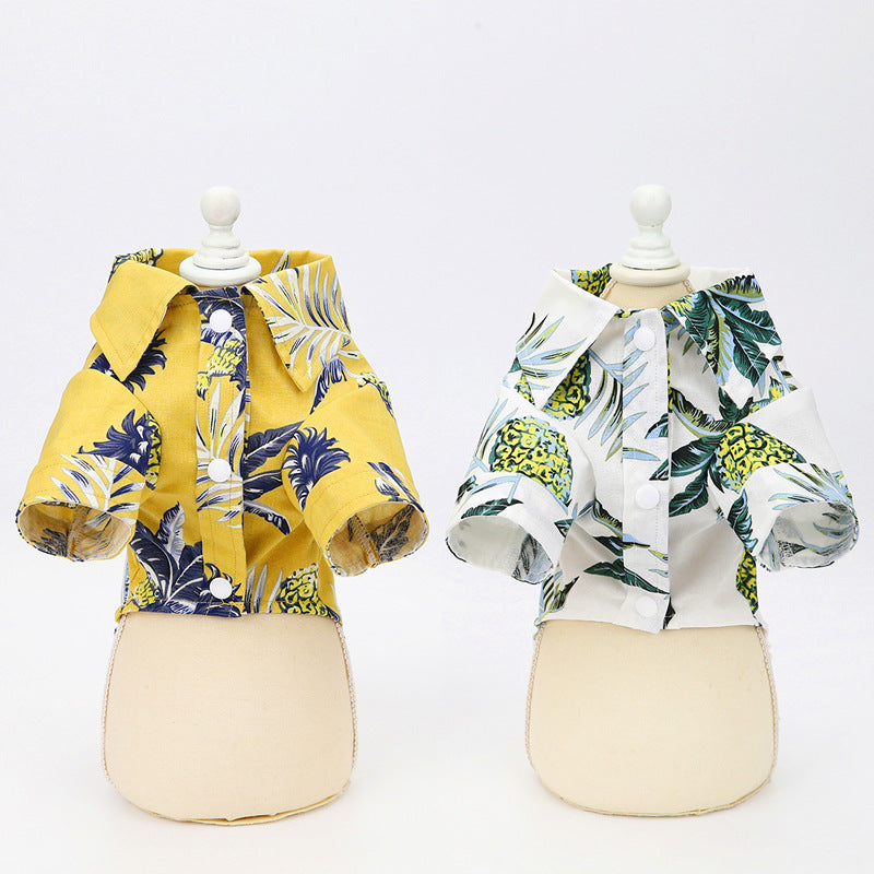 White and green tropical-print cotton dog shirt, front view