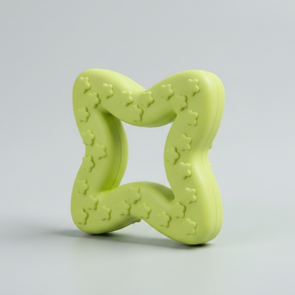 Lime green star-shaped rubber chew toy with raised paw-texture nubs.
