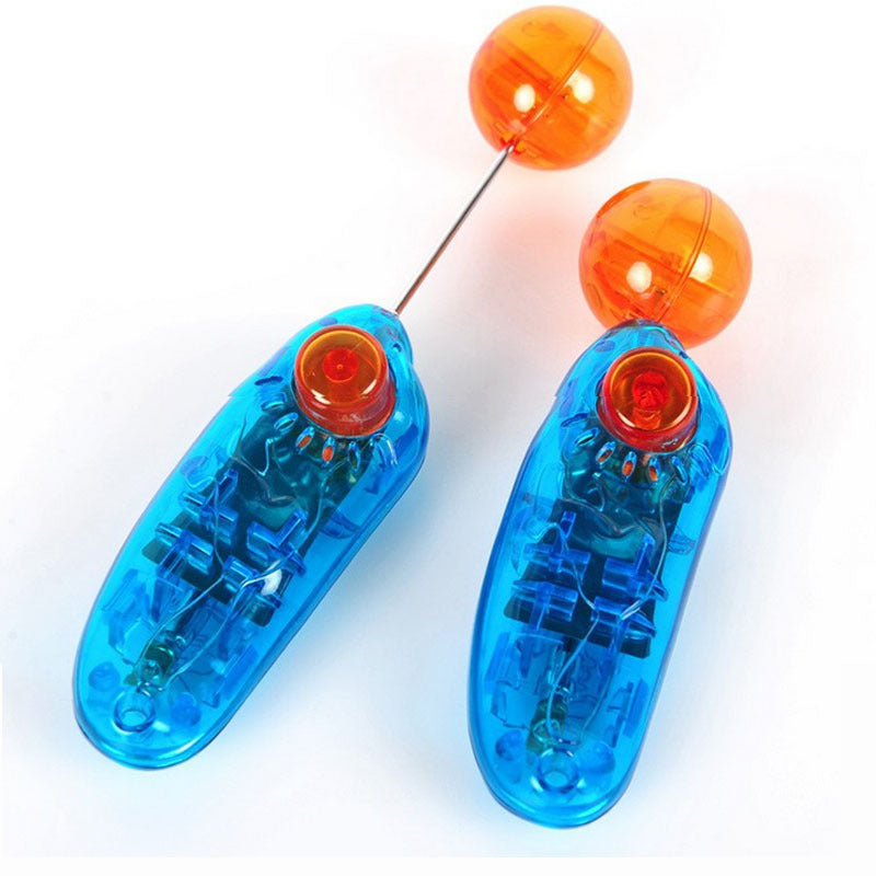 Blue translucent dog training toy pair with orange glowing ball tops and red centers
