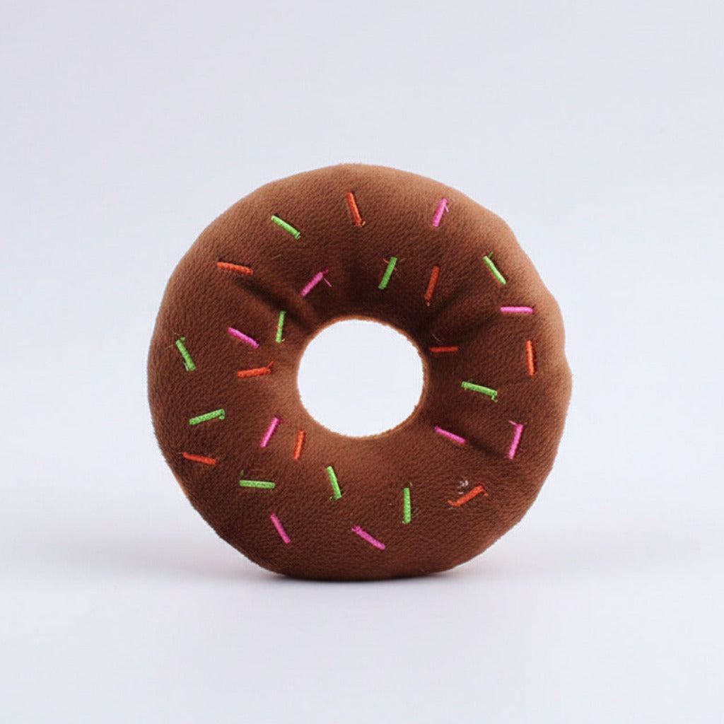 Brown plush donut dog toy with colorful sprinkles and round center hole