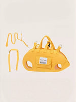Yellow portable pet carrier harness kit with shoulder strap and front ID pocket