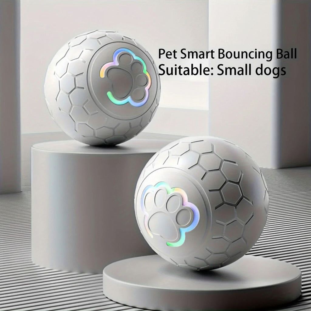 Rechargeable smart bouncing ball in grey, with glowing paw emblem on front