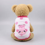 Pet fleece vest in white with pink cartoon animal face and paw prints