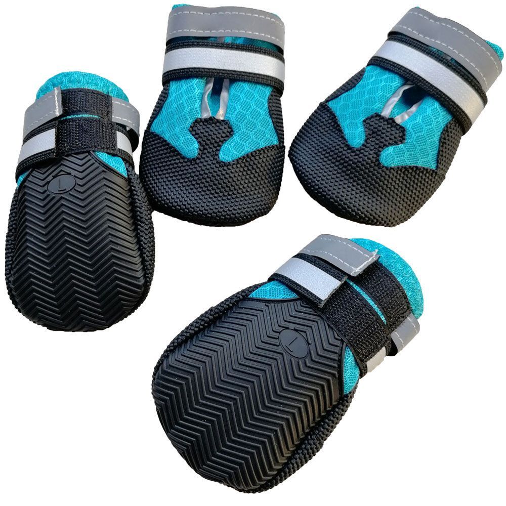 Assorted angles of blue dog shoe covers with black soles and adjustable hook-and-loop straps