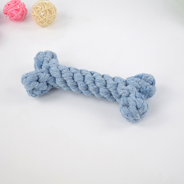 Light blue crocheted dog bone toy with knotted ends