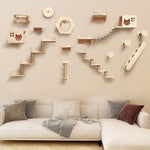 Wall-mounted cat climbing frame with modular wooden steps, platforms, and perches