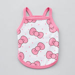 Pink-trim pet tank top with white base and pink bow pattern print on the front.