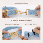 Light blue teddy harness with reinforced stitching, metal buckle, and detachable bowtie