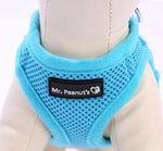 Blue mesh dog harness with padded neck ring and Mr. Peanut's logo patch