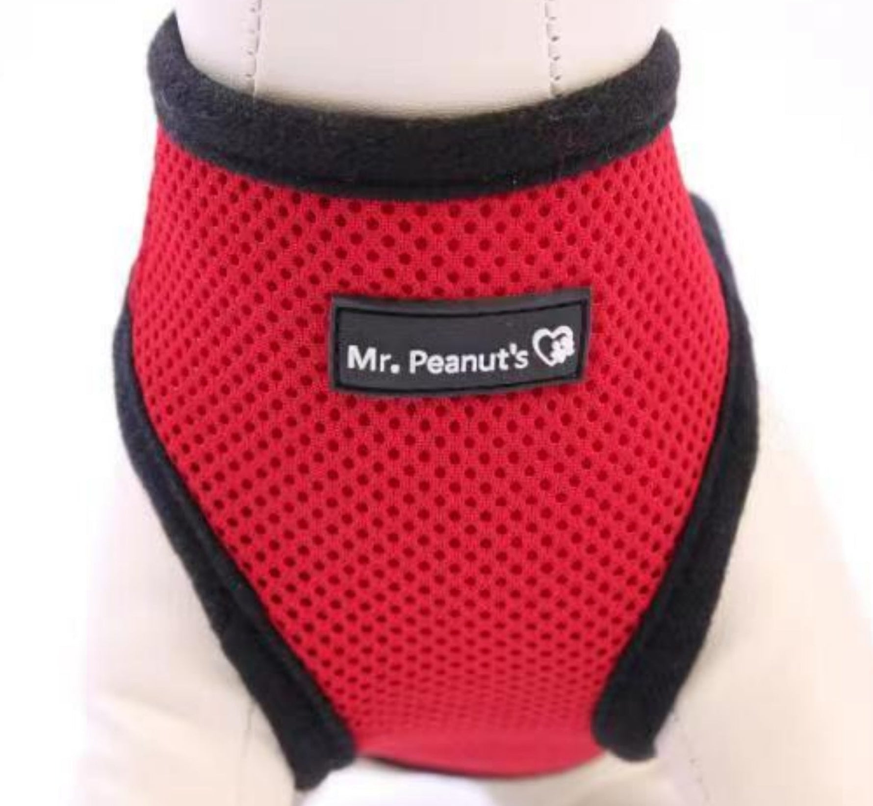 Red mesh dog harness with black trim and Mr. Peanut's logo patch