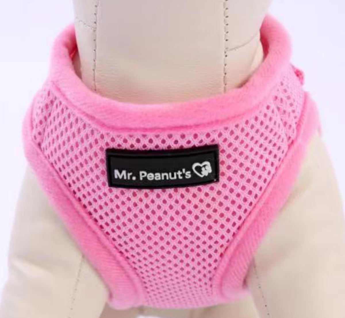 Pink mesh dog harness with black trim and Mr. Peanut's logo patch