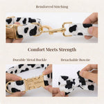 Leash with metal clasp and adjustable connector on white fabric with black spots