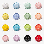 Assorted stoneware pet bowls, round shallow dish with glossy pastel and dark colors.