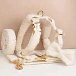 Cream knitted dog collar and bowtie set with gold hardware, leash and harness pieces