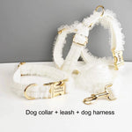 White ruffled dog collar, leash, and harness set with gold-tone clasps and rings