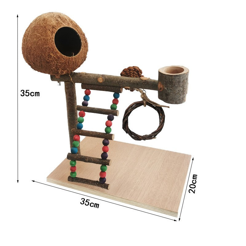 Wood parrot training platform with beaded ladder, coconut nest, rope ring, and cup.