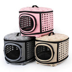 Stacked foldable pet carriers in pink, gray, and beige with round mesh front doors
