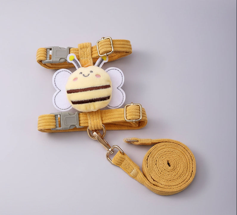 Yellow plush traction rope dog harness with bee-themed patch and braided leash strap